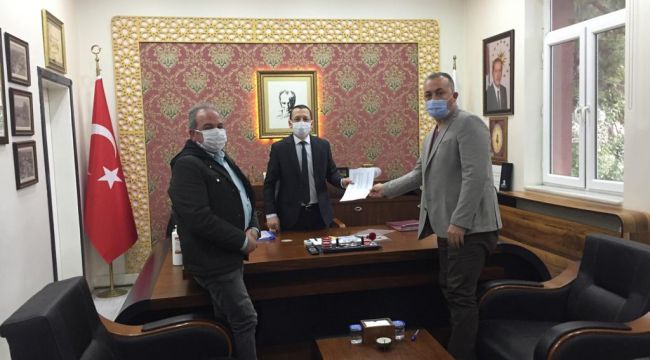 TURGUTLU'DA İŞYERİ KAPANAN VE İHTİYAÇ SAHİBİ ESNAFA 900 TL DESTEK